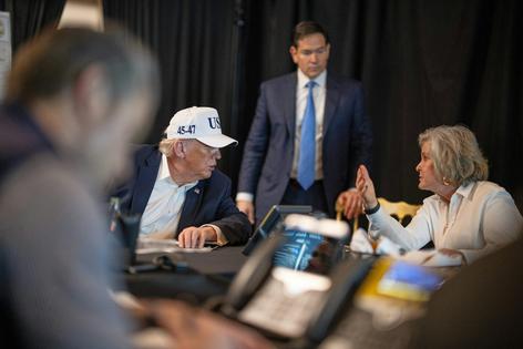 This photo provided by the White House shows President Donald Trump talking with White House chief of staff Susie Wiles as Secretary of State Marco Rubio listens at Mar-a-Lago during Operation Epic Fury on Feb. 28, 2026.
              Daniel Torok/The White House via AP