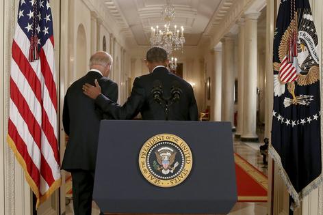 President Barack Obama and Vice President Joe Biden walk away from the lectern after Obama announced a nuclear deal with Iran on July 14, 2015.
              AP Photo/Andrew Harnik, Pool