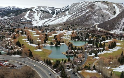 The snow drought was evident in Park City, Utah, on Feb. 9, 2026. This golf course is normally used for cross-country skiing in winter. Mario Tama/Getty Images