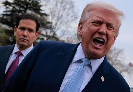 WASHINGTON, DC - MARCH 20: U.S. President Donald Trump speaks to reporters as he and Secretary of State Marco Rubio (L) depart the White House on their way to Florida on March 20, 2026 in Washington, DC. Trump is spending the weekend at his private Mar-a-Lago Club. (Photo by Chip Somodevilla/Getty Images)