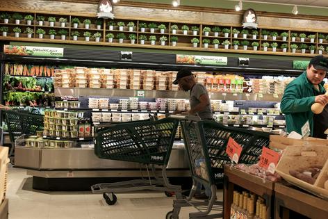 Grocery prices are affected by costs of fuel and fertilizer.
              Joe Raedle/Getty Images