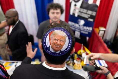 An attendee visits a stand at the Conservative Political Action Conference in Grapevine, Texas, on March 26, 2026.
              Leandro Lozada/AFP via Getty Images