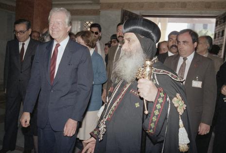 Former U.S. President Jimmy Carter  with Pope Shenuda III, patriarch of the Coptic Orthodox Church, on March 21, 1987, in Cairo, Egypt.
              AP Photo/Paola Crociani