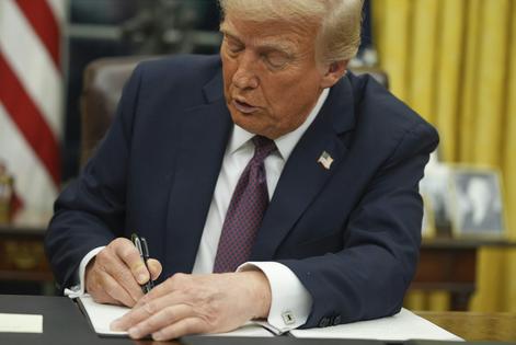 President Donald Trump signs an executive order on birthright citizenship in the Oval Office on Jan. 20, 2025.
              AP Photo/Evan Vucci, File