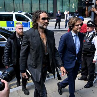 Bang Showbiz / Russell Brand will face trial in October