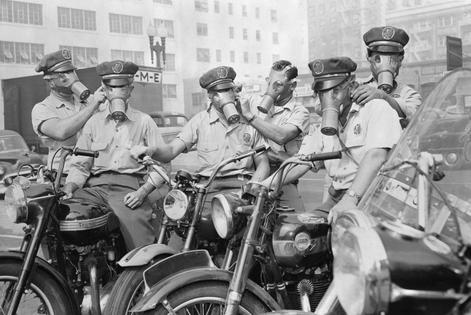 After several of its motorcycle messengers became ill from driving in smog in 1955, a Los Angeles printing company bought gas masks for them.
Bettmann via Getty Images