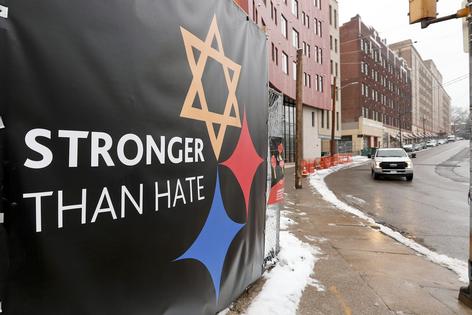 Communities came together after the shooting at Tree of Life Synagogue in Pittsburgh.
              AP Photo/Keith Srakocic
