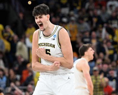 Robin Buckson/The Detroit News/TNS