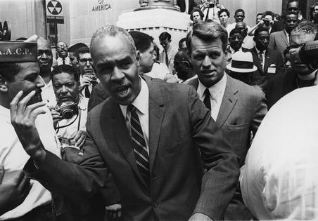 NAACP leader Roy Wilkins walks in front of U.S. Attorney General Robert Kennedy during an NAACP march on June 24, 1964, in Washington, protesting the disappearance of three civil rights workers in Mississippi.
              Washington Bureau/Getty Images