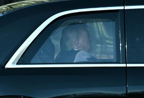 U.S. President Donald Trump rides in his motorcade as he departs the White House for the Supreme Court in Washington, D.C., on April 1, 2026. Trump attended in person as the Supreme Court heard a landmark case weighing the constitutionality of his contentious bid to end birthright citizenship, an extraordinary and possibly unprecedented move for the nation's highest office. (Brendan Smialowski/AFP/Getty Images/TNS)