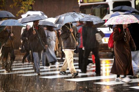 All-day drizzles come from steady storms that don’t have much upward wind flow.
AP Photo/Matt Rourke