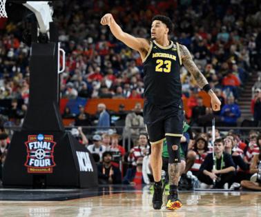 Robin Buckson/The Detroit News/TNS