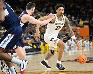 Robin Buckson/The Detroit News/TNS