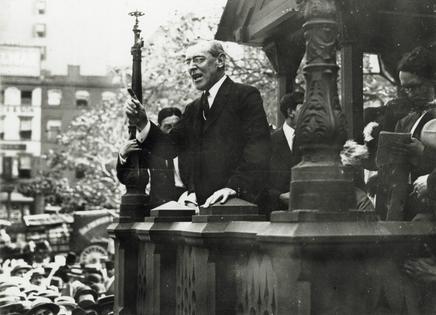 Woodrow Wilson, who as president resegregated the federal civil service, speaks to a crowd in September 1912.
Library of Congress/Corbis/VCG via Getty Images