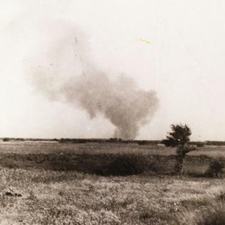 A clandestine photograph taken by Franciszek Ząbecki shows Treblinka II burning during the prisoner uprising on Aug. 2, 1943.
              'Treblinka II – Obóz zagłady' via Wikimedia Commons