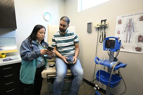 Inclusive health care settings are essential to the well-being of LGBTQ+ patients. AP Photo/Phelan M. Ebenhack