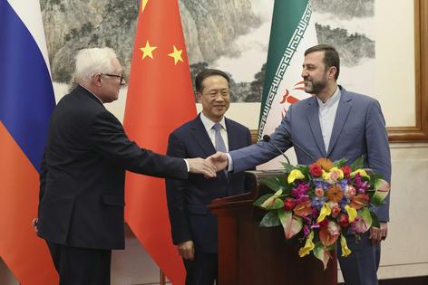 Russian, Chinese and Iranian diplomats have a confab in 2025 in Beijing.
              Lintao Zhang/Pool Photo via AP
