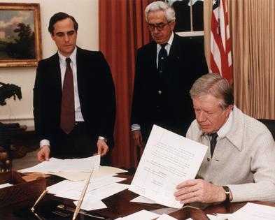 President Jimmy Carter, seen here at his Oval Office desk, signed legislation in 1978 that he said would ‘ensure that Presidential papers remain public property after the expiration of a President’s term.’
Corbis/Getty Images
