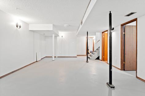 Wraps will add interest to these basement support poles. (Dreamstime/TCA)