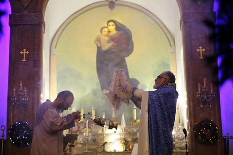 Armenians celebrate the new year with a ceremony at the Holy Mary Armenian Church in Tehran on Jan. 1, 2026.
Fatemeh Bahrami/Anadolu via Getty Images