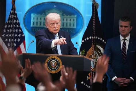 President Donald Trump and Defense Secretary Pete Hegseth conduct a news conference in the White House briefing room about the war in Iran on April 6, 2026.
              Tom Williams/CQ-Roll Call, Inc via Getty Images