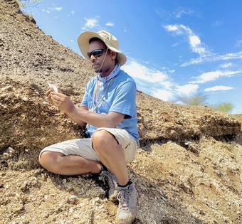 The author conducts fieldwork in the East African Rift, collecting samples from ancient lake and river deposits.
              Courtesy of Zelalem Bedaso