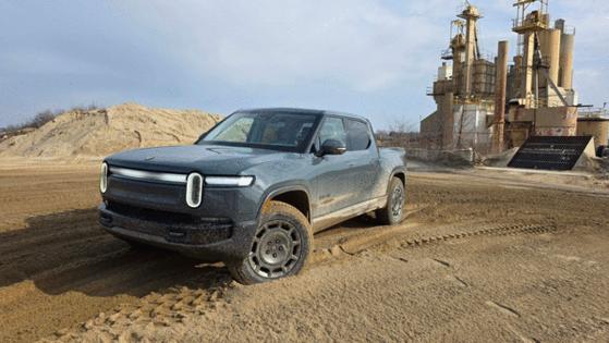 Henry Payne/The Detroit News/TNS