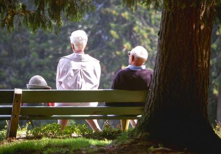Senior couple taking a rest on a hiking trip. Dreamstime/TCA