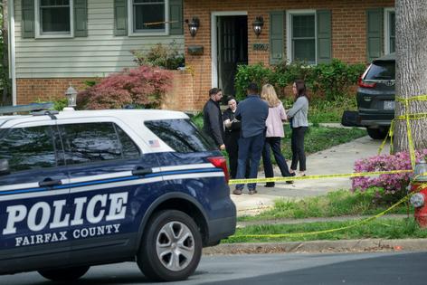 Law enforcement officers secure a crime scene at the home of former Virginia Lt. Gov. Justin Fairfax on April 16, 2026.
              Alex Wong/Getty Images via Getty Images News