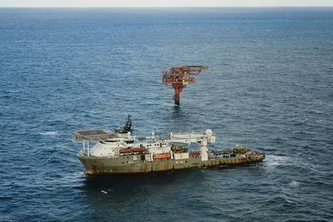 Drilling rigs in the North Sea are still operating and shipping oil.
              AP Photo/James Brooks