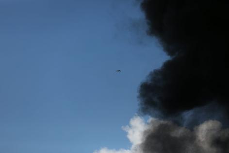 A drone is seen during a suspected drone strike targeting an oil warehouse near Erbil, the capital of Iraq's Kurdistan Region, on April 1, 2026.  Gailan Haji/Middle East Images/AFP via Getty Images