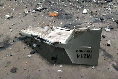 This undated photograph released by the Ukrainian military’s Strategic Communications Directorate shows the wreckage of what Kyiv has described as an Iranian Shahed drone downed near Kupiansk, Ukraine.
              Ukrainian military's Strategic Communications Directorate via AP