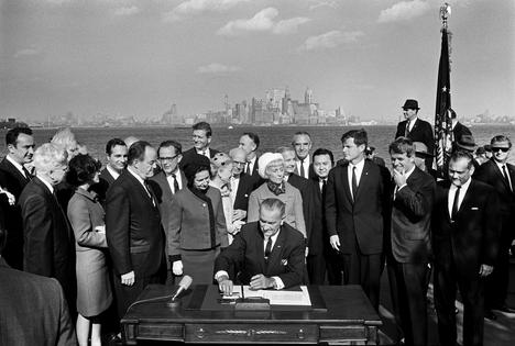 President Lyndon B. Johnson signs the Immigration and Nationality Act of 1965 on Liberty Island, N.Y., on Oct. 3, 1965.
              GHI/Universal History Archive/Universal Images Group via Getty Images