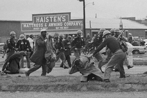 State troopers in Selma, Ala., swing billy clubs on March 7, 1965, to break up a march by advocates for Black Americans’ voting rights.
              AP Photo, File