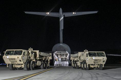 Trucks carry parts of U.S. missile launchers and other equipment needed for the THAAD missile defense system at Osan Air Base, South Korea, in 2017.
              NurPhoto/Contributor/Getty Images