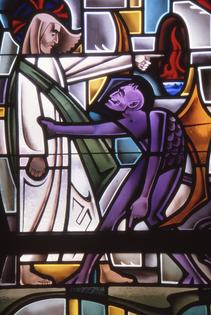 Stained Glass depiction of Devil tempting Jesus in the desert. Dreamstime/TCA