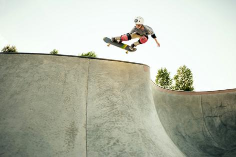 Helmets are essential gear when skateboarding. Daniel Milchev/The Image Bank via Getty Images