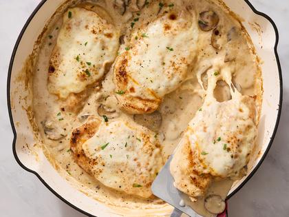 Enjoy juicy chicken breasts in a mushroom-sherry cream sauce, topped with melty Muenster cheese. (Erik Bernstein/TCA)