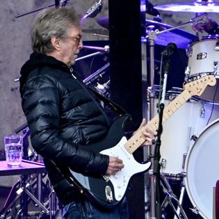 Bang Showbiz / Eric Clapton ended his Madrid concert early after a flying vinyl sleeve hit him in the chest onstage