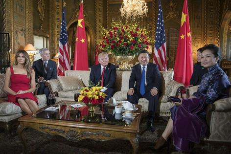 U.S. first lady Melania Trump, Donald Trump, Chinese President Xi Jinping and his wife, Peng Liyuan, in West Palm Beach, Fla., on April 6, 2017.
              Jim Watson /AFP via Getty Images