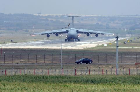 A U.S. military aircraft lands at Incirlik Air Base in Adana, Turkey, as part of the operations against ISIS on Aug. 10, 2015.
              Volkan Kasik/Anadolu Agency/Getty Images