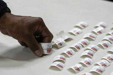 In our poll, roughly one-third of political moderates and African Americans who voted for Trump in 2024 said they would vote otherwise if the election were held again.
              AP Photo/George Walker IV, File