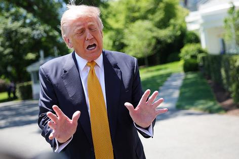WASHINGTON, DC - MAY 12: U.S. President Donald Trump speaks to the press as he departs the White House on May 12, 2026 in Washington, DC. Trump is traveling to China where he is scheduled to meet with Chinese President Xi Jinping for expected talks on the Iran conflict, trade imbalances, regional security, and economic cooperation between the two countries. (Photo by Kevin Dietsch/Getty Images)