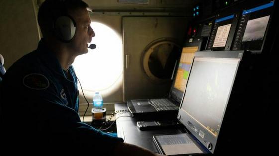 Flight Director Quinn Kalen at his work station during a flight into Hurricane Lee on Sept. 8, 2023.
Lt Cmdr Utama/NOAA Corps