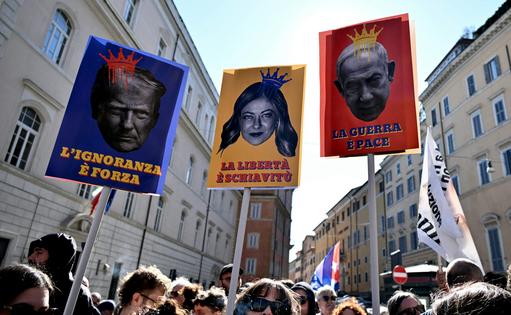 Protesters against the Iran war carry placards in Rome on March 28, 2026, depicting U.S. President Donald Trump, Italy’s Prime Minister Giorgia Meloni and Israeli Prime Minister Benjamin Netanyahu.
Tiziana Fabi/AFP via Getty Images