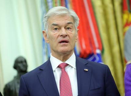 Administrator for the Centers for Medicare & Medicaid Services Mehmet Oz speaks at an event with U.S. President Donald Trump on maternal healthcare in the Oval Office of the White House on May 11, 2026, in Washington, D.C. (Kevin Dietsch/Getty Images/TNS)
