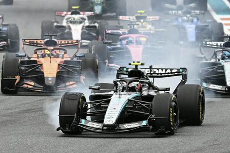 Formula 1 drivers maneuver for position during the 2026 Miami Formula One Grand Prix in Florida. Chandan Khanna / AFP via Getty Images