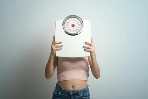 Each person's body has a different sweet spot for weight that it tries to maintain. Francesco Carta fotografo/Moment via Getty Images