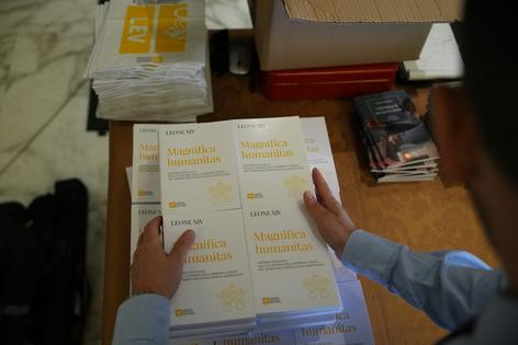 Copies of Leo XIV’s first encyclical, Magnifica Humanitas, were distributed at the Vatican on May 25, 2026.
AP Photo/Alessandra Tarantino