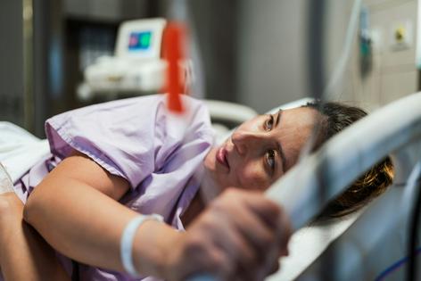 Inadequate knowledge of postpartum complications can lead to delayed care-seeking.
              Kemal Yildirim/E+ Collection via Getty Images